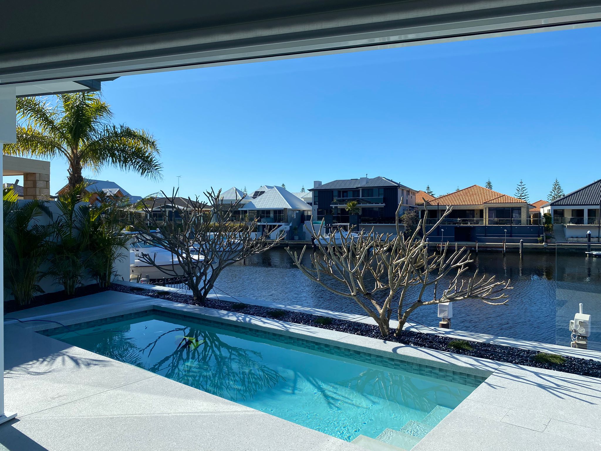 mandurah-waterfront-property-pool-area-windows