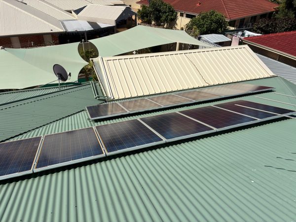 Solar panel cleaning in Bertram - 12 polycrystalline panels across two roof pitches on sage green Colorbond roof